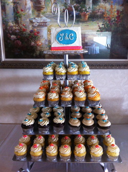 multiple types of cupcakes in a tower