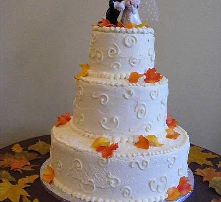 mickey and minnie on a wedding cake top