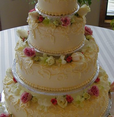 flowers and frilly wedding cake