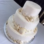 white cake with shells