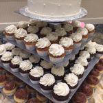 cupcakes with white and brown frosting